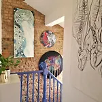 Charming Bedroom In Artist Studio