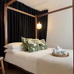 Chic Marble Arch With 100 Inch Cinema & Premium Mattress, By The Design Traveller