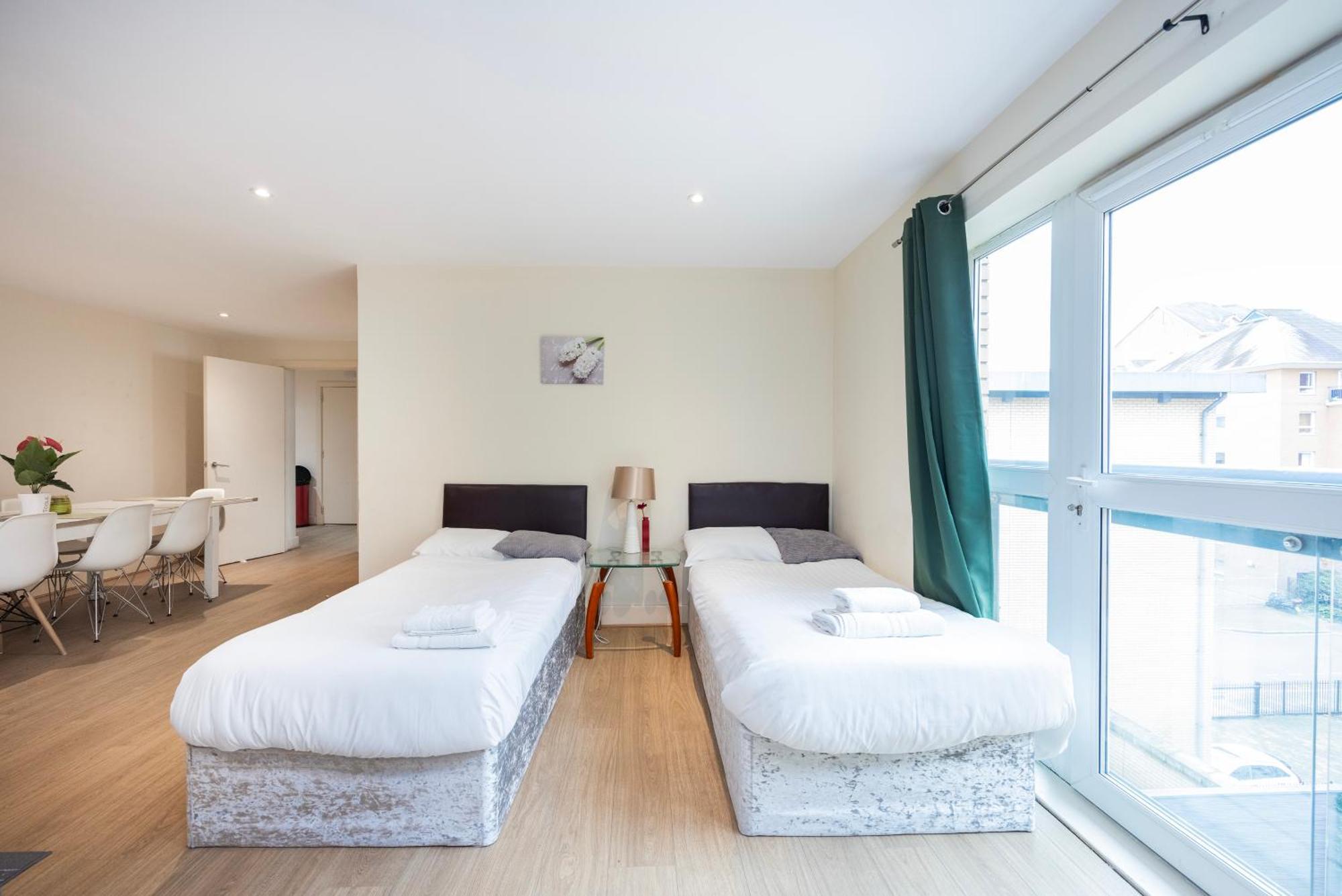 Heads On Bed - Docklands Canary Wharf Excel Appartement
