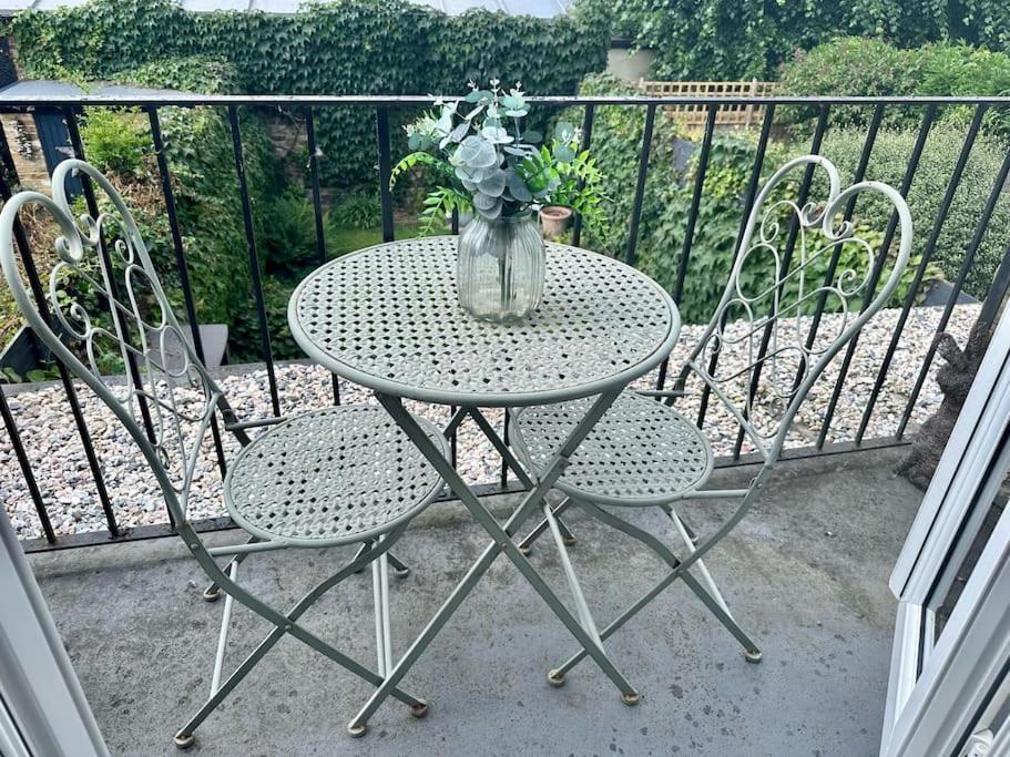 With Balcony Overlooking A Garden *