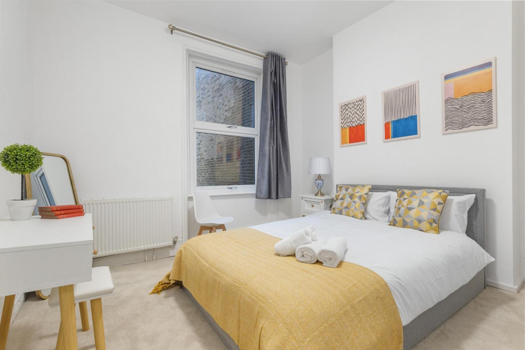Modern 5-bedroom Fulham Flat - Sleeps 12 Apartamento *