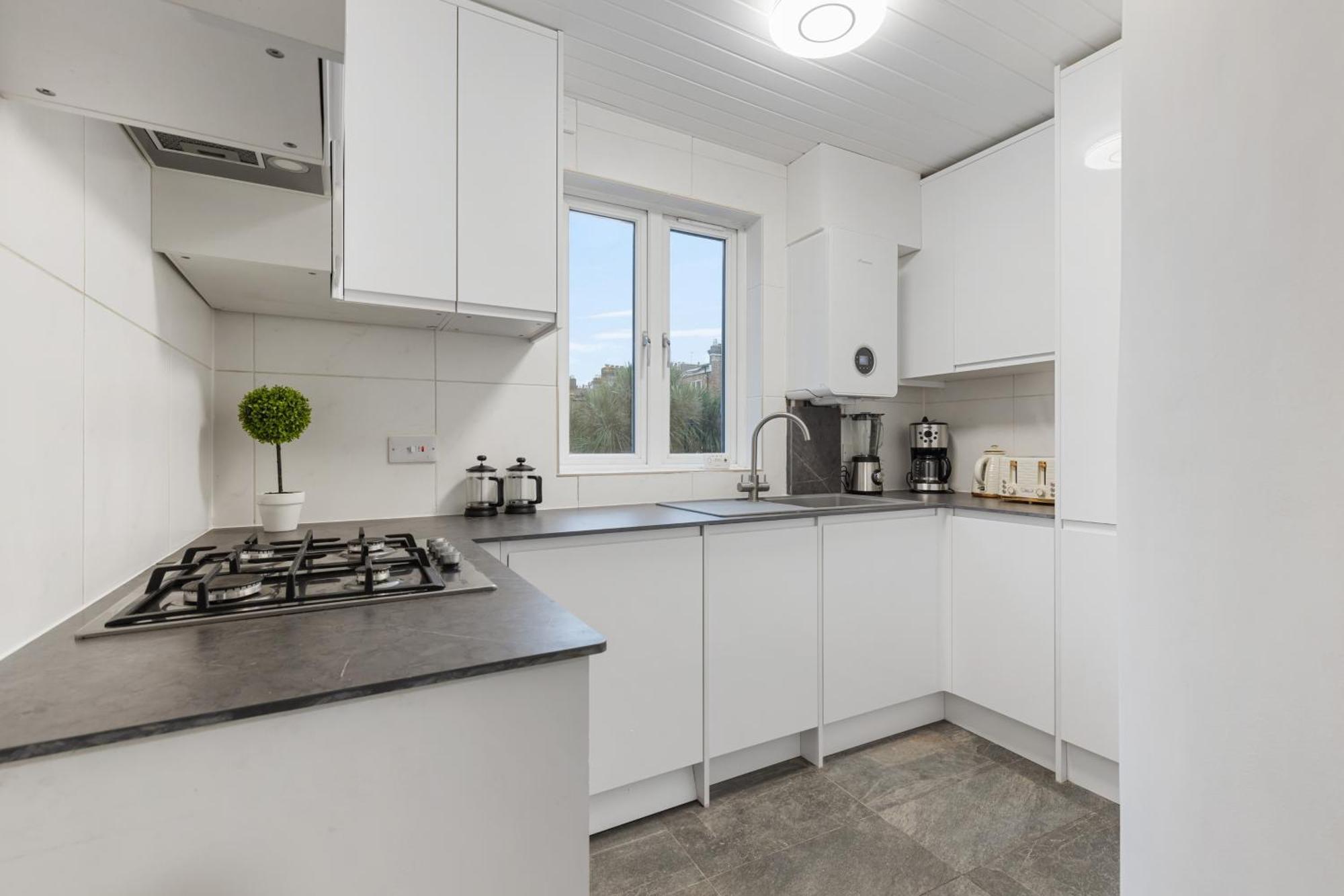 Modern 5-bedroom Fulham Flat - Sleeps 12 Apartamento *