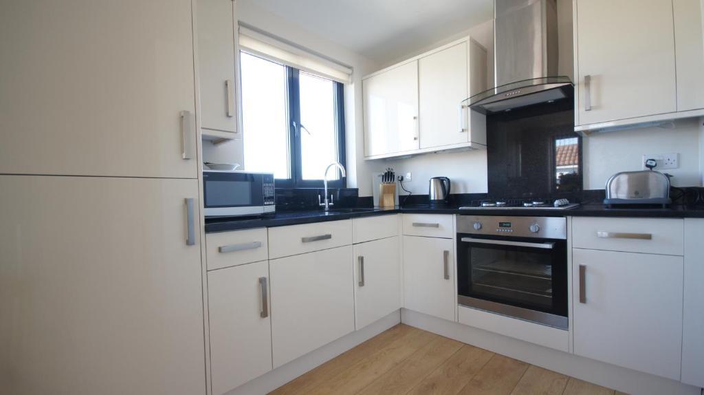 Appartement Crompton Court Londen