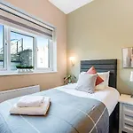 Wake, Sip, Slay Stylish Studio With Cozy Feels 3