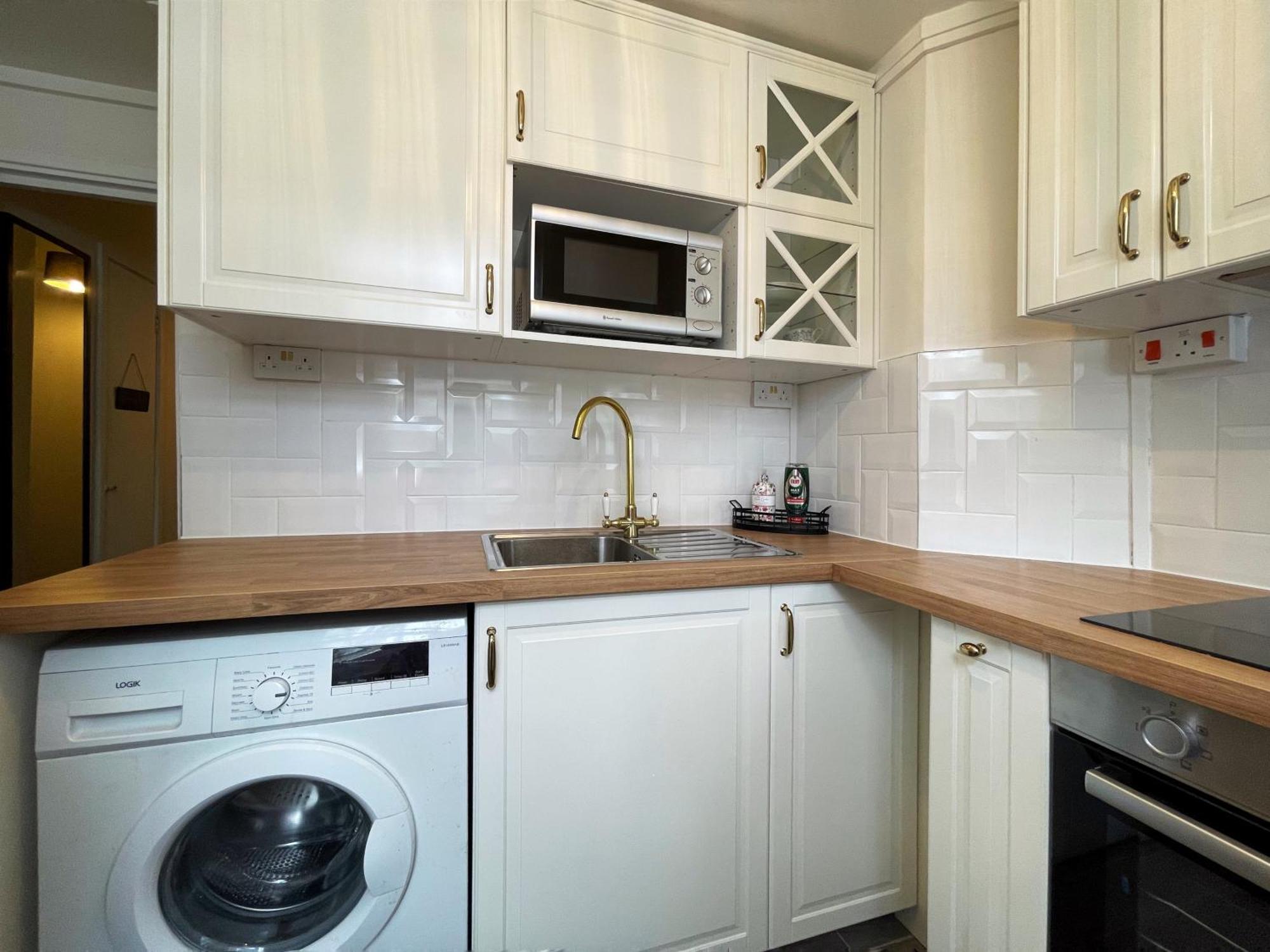 Apartment Harper's Place Near Kings Cross - 2 Double Beds, 1 Sofa Bed, Great Location, Ideal For Families London