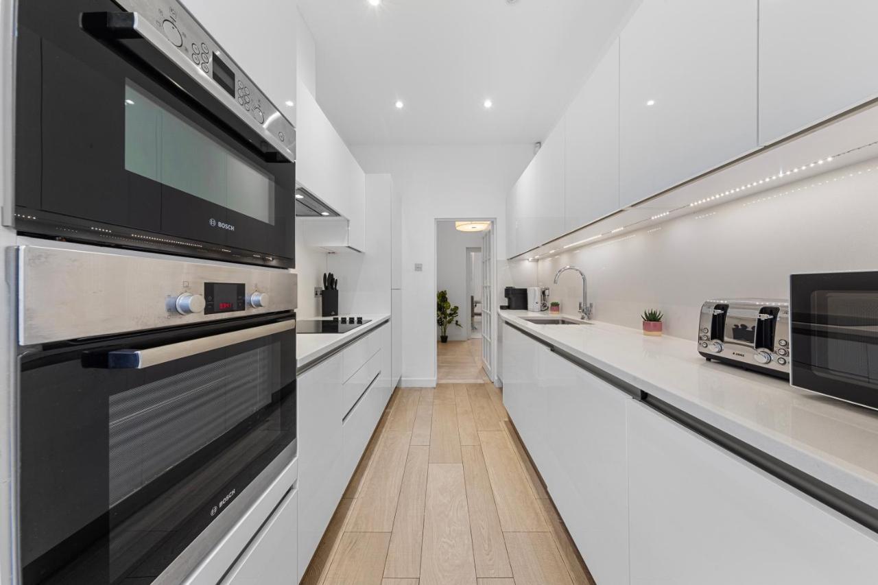 Appartement Harrods 2 Bed Lux Flat W/patio